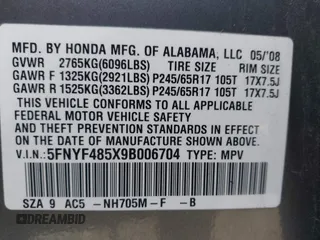 2009 Honda Pilot EX-L with VIN 5FNYF485X9B006704, listed as a IAAI auction lot 41749272 with 34,480 mi miles. Bid and sale history available at carsss.com. Image 9.