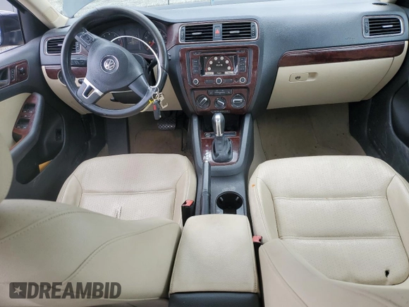 2011 Volkswagen Jetta SEL with VIN 3VWLZ7AJ1BM304504, listed as a Copart auction lot 60991215 with 189,148 mi miles and Salvage title. Bid and sale history available at DreamBid. Image 8.