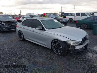 2013 BMW 3 Series 335i with VIN WBA3A9C50DF475024, listed as a IAAI auction lot 40884045 with 120,121 mi miles. Bid and sale history available at carsss.com. Image 1.