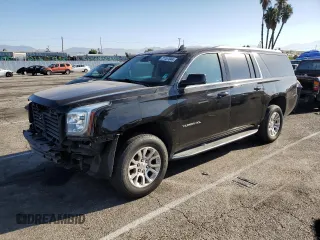 2018 GMC Yukon XL SLT with VIN 1GKS1GKC6JR305624, listed as a Copart auction lot 71157044 with 283,155 mi miles and Salvage Title. Bid and sale history available at carsss.com. Image 1.