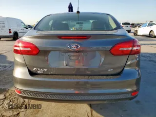 2018 Ford Focus SE z VIN 1FADP3F2XJL256272, wystawiony jako Copart lot #52651675 z przebiegiem 37 897 mil mil oraz Szkody całkowita. Historia ofert i sprzedaży dostępna na DreamBid. Obrazek 6.