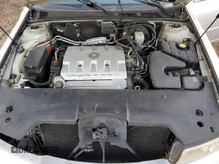 2000 Cadillac Seville Touring STS z VIN 1G6KY5494YU201138, wystawiony jako Copart lot #73485584 z przebiegiem 137 913 mil mil oraz Szkoda całkowita • Salvage title. Historia ofert i sprzedaży dostępna na DreamBid. Obrazek 11.
