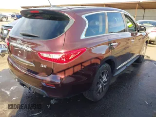 2013 Infiniti JX35 with VIN 5N1AL0MM0DC324641, listed as a IAAI auction lot 41309512 with 133,247 mi miles. Bid and sale history available at carsss.com. Image 4.