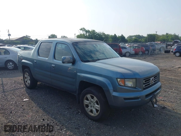 2006 Honda Ridgeline RTL with VIN 2HJYK16526H531884, listed as a IAAI auction lot 42796524 with 334,489 mi miles and . Bid and sale history available at DreamBid. Image 1.