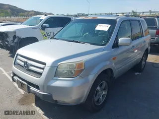 2007 Honda Pilot EX-L with VIN 5FNYF28587B012793, listed as a IAAI auction lot 41964324 with 230,128 mi miles. Bid and sale history available at carsss.com. Image 2.