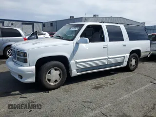 1998 GMC Suburban with VIN 3GKFK16R3WG501070, listed as a Copart auction lot 65256815 with 255,022 mi miles and Salvage title. Bid and sale history available at DreamBid. Image 1.