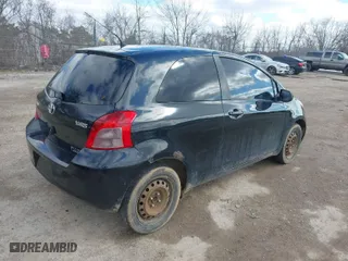 2008 Toyota Yaris with VIN JTDJT923685187475, listed as a IAAI auction lot 41860961 with 223,841 mi miles. Bid and sale history available at carsss.com. Image 4.
