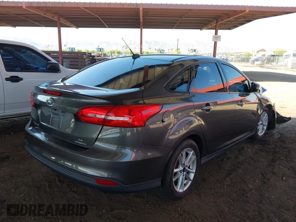 2015 Ford Focus SE z VIN 1FADP3F21FL210742, wystawiony jako IAAI lot #42418476 z przebiegiem 155 829 mil mil oraz . Historia ofert i sprzedaży dostępna na DreamBid. Obrazek 4.