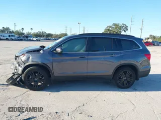 2022 Honda Pilot Special Edition with VIN 5FNYF5H25NB035016, listed as a IAAI auction lot 41248194 with 30,039 mi miles and . Bid and sale history available at DreamBid. Image 14.