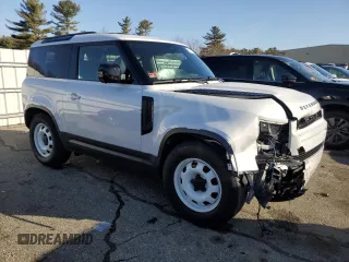 2023 Land Rover Defender S with VIN SALEJ6EX6P2147281, listed as a Copart auction lot 84217414 with 27,758 mi miles and Salvage title. Bid and sale history available at DreamBid. Image 4.