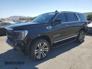 2021 GMC Yukon SLT with VIN 1GKS1BKDXMR119990, listed as a Copart auction lot 74733094 with 73,597 mi miles and Salvage Title. Bid and sale history available at carsss.com. Image 1.