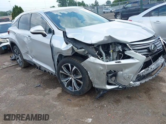2017 Lexus RX 350 z VIN 2T2BZMCA9HC124727, wystawiony jako IAAI lot #42580173 z przebiegiem 106 749 mil mil oraz . Historia ofert i sprzedaży dostępna na DreamBid. Obrazek 1.