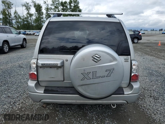 2006 Suzuki XL7 z VIN JS3TX92V564102483, wystawiony jako Copart lot #57185865 z przebiegiem 152 864 mil mil oraz Szkoda całkowita • Salvage title. Historia ofert i sprzedaży dostępna na DreamBid. Obrazek 6.
