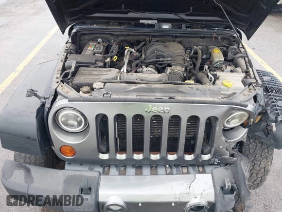 2013 Jeep Wrangler Unlimited Sport z VIN 1C4BJWDGXDL596450, wystawiony jako IAAI lot #42323862 z przebiegiem 114 105 mil mil oraz . Historia ofert i sprzedaży dostępna na DreamBid. Obrazek 10.