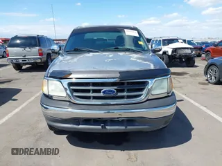 2002 Ford F-150 XLT with VIN 1FTRW07L22KB41794, listed as a IAAI auction lot 42072478 with 116,252 mi miles and . Bid and sale history available at DreamBid. Image 6.