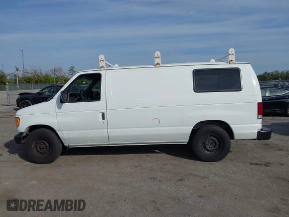 2001 Ford Econoline Cargo with VIN 1FTRE14291HA84414, listed as a IAAI auction lot 41463623 with 192,835 mi miles. Bid and sale history available at carsss.com. Image 15.