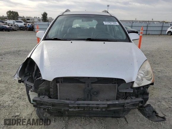 2009 Kia Rondo LX Base with VIN KNAFG528097222268, listed as a Copart auction lot 77797124 with 184,569 mi miles and Salvage Title. Bid and sale history available at carsss.com. Image 5.
