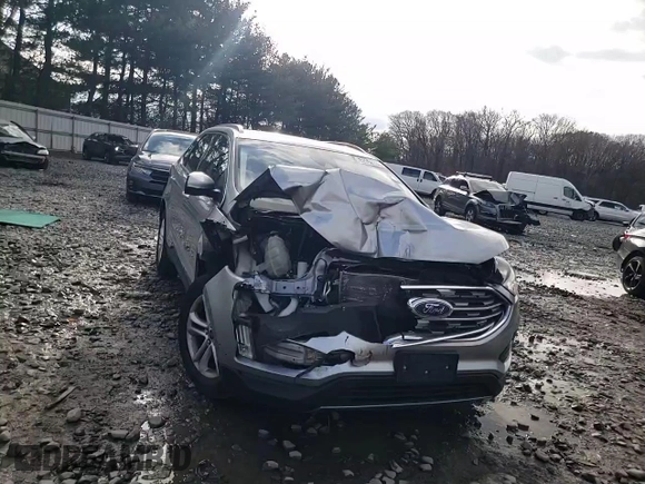 2020 Ford Edge SEL z VIN 2FMPK4J95LBA29912, wystawiony jako Copart lot #82968534 z przebiegiem 104 083 mil mil oraz Szkoda całkowita • Salvage title. Historia ofert i sprzedaży dostępna na DreamBid. Obrazek 11.