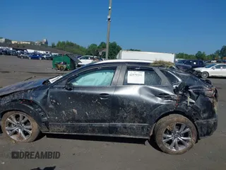 2023 Mazda CX-30 S Carbon Edition with VIN 3MVDMBCM6PM510231, listed as a IAAI auction lot 42579591 with 29,240 mi miles and . Bid and sale history available at DreamBid. Image 6.