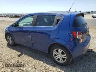 2014 Chevrolet Sonic LT with VIN 1G1JC6SB6E4120665, listed as a Copart auction lot 52042055 with 132,940 mi miles and Clean Title. Bid and sale history available at carsss.com. Image 2.