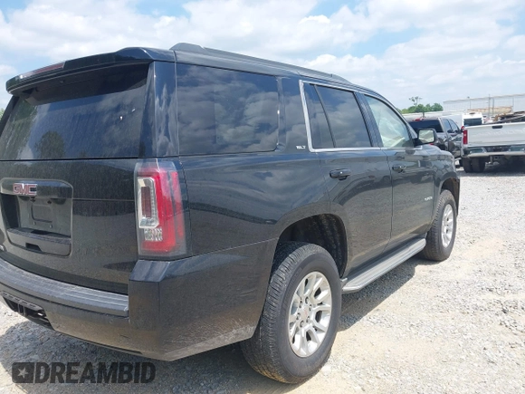 2015 GMC Yukon SLT with VIN 1GKS2BKC5FR275085, listed as a IAAI auction lot 42025693 with Not Provided miles. Bid and sale history available at carsss.com. Image 4.