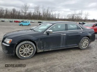 2013 Chrysler 300 with VIN 2C3CCAKT1DH665741, listed as a Copart auction lot 50140995 with 147,001 mi miles and Salvage Title. Bid and sale history available at carsss.com. Image 1.