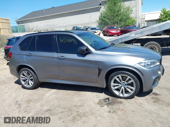 2014 BMW X5 xDrive50i with VIN 5UXKR6C57E0J72301, listed as a IAAI auction lot 39379887 with 117,012 mi miles. Bid and sale history available at carsss.com. Image 13.