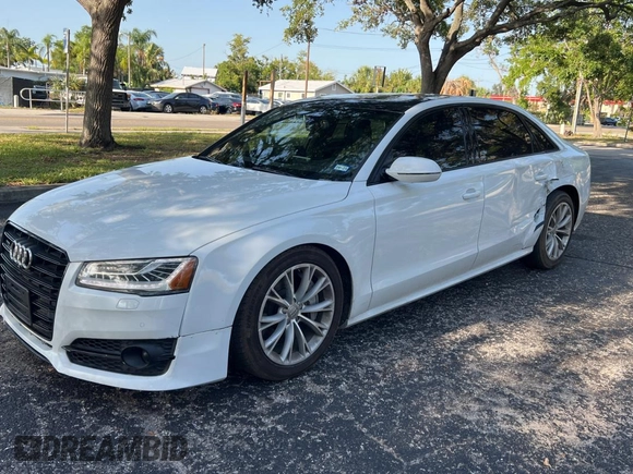 2017 Audi A8 Sport z VIN WAU43AFD7HN005619, wystawiony jako Copart lot #57526015 z przebiegiem 57 262 mil mil oraz Szkoda całkowita • Salvage title. Historia ofert i sprzedaży dostępna na DreamBid. Obrazek 2.