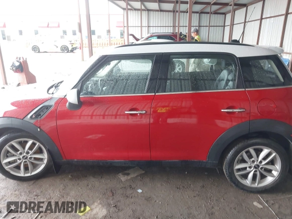 2014 MINI Countryman S with VIN WMWZC3C53EWP27111, listed as a IAAI auction lot 42192799 with 136,945 mi miles and . Bid and sale history available at DreamBid. Image 14.