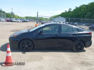 2022 Toyota Prius L Eco with VIN JTDKAMFU0N3175619, listed as a IAAI auction lot 42098135 with 72,984 mi miles and . Bid and sale history available at DreamBid. Image 14.