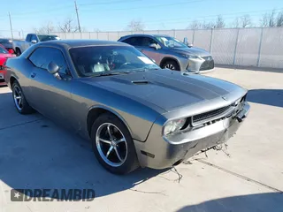 2012 Dodge Challenger SXT Plus with VIN 2C3CDYAG1CH262352, listed as a IAAI auction lot 41662002 with 141,868 mi miles. Bid and sale history available at carsss.com. Image 1.