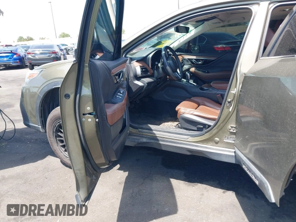 2021 Subaru Outback Touring XT with VIN 4S4BTGPD0M3108667, listed as a IAAI auction lot 42087427 with 127,954 mi miles and . Bid and sale history available at DreamBid. Image 5.