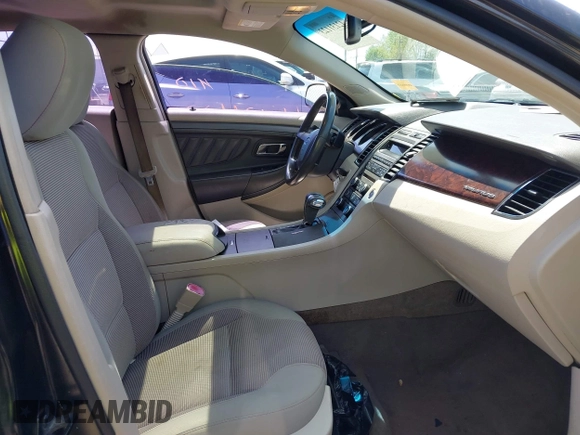2011 Ford Taurus SEL with VIN 1FAHP2EW6BG127102, listed as a IAAI auction lot 42131123 with 168,965 mi miles. Bid and sale history available at carsss.com. Image 5.