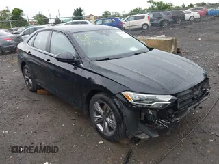 2023 Volkswagen Jetta SE with VIN 3VW7M7BUXPM038075, listed as a IAAI auction lot 42314234 with 19,490 mi miles and . Bid and sale history available at DreamBid. Image 1.