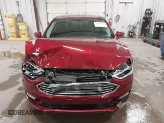 2017 Ford Fusion SE z VIN 3FA6P0HD8HR405800, wystawiony jako IAAI lot #41823918 z przebiegiem 54 034 mil mil oraz . Historia ofert i sprzedaży dostępna na DreamBid. Obrazek 13.