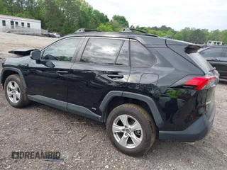 2021 Toyota RAV4 Hybrid XLE with VIN JTMRWRFV2MD133113, listed as a IAAI auction lot 42087394 with 103,019 mi miles and . Bid and sale history available at DreamBid. Image 3.