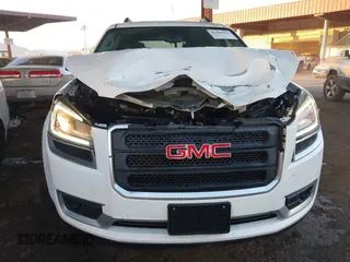 2014 GMC Acadia SLE with VIN 1GKKRNED5EJ198524, listed as a IAAI auction lot 41098195 with 132,572 mi miles and . Bid and sale history available at carsss.com. Image 6.