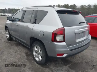 2016 Jeep Compass Latitude with VIN 1C4NJCEA2GD719694, listed as a IAAI auction lot 41508771 with 121,469 mi miles. Bid and sale history available at carsss.com. Image 3.