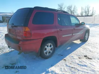 2005 GMC Envoy SLE with VIN 1GKET16S056147701, listed as a IAAI auction lot 41263739 with 179,455 mi miles. Bid and sale history available at carsss.com. Image 4.