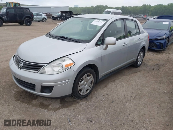 2010 Nissan Versa S with VIN 3N1BC1AP9AL404584, listed as a IAAI auction lot 42367293 with 158,377 mi miles and . Bid and sale history available at DreamBid. Image 2.