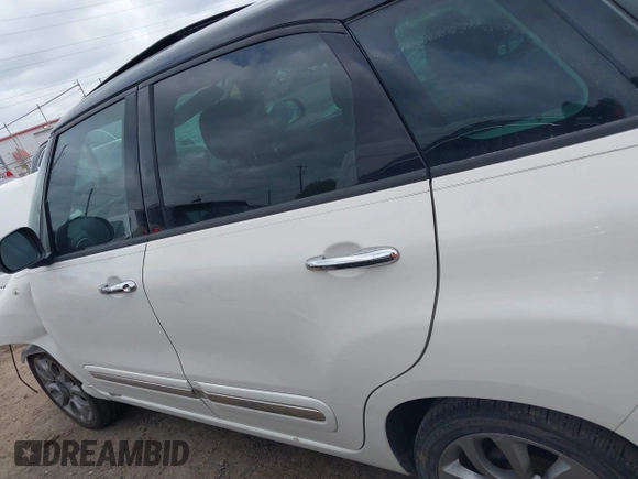 2014 FIAT 500L Lounge z VIN ZFBCFACH4EZ029431, wystawiony jako IAAI lot #42110055 z przebiegiem 103 789 mil mil oraz . Historia ofert i sprzedaży dostępna na DreamBid. Obrazek 14.