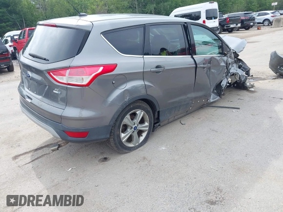 2014 Ford Escape SE with VIN 1FMCU9G97EUB27835, listed as a IAAI auction lot 42530986 with 137,933 mi miles and . Bid and sale history available at DreamBid. Image 4.