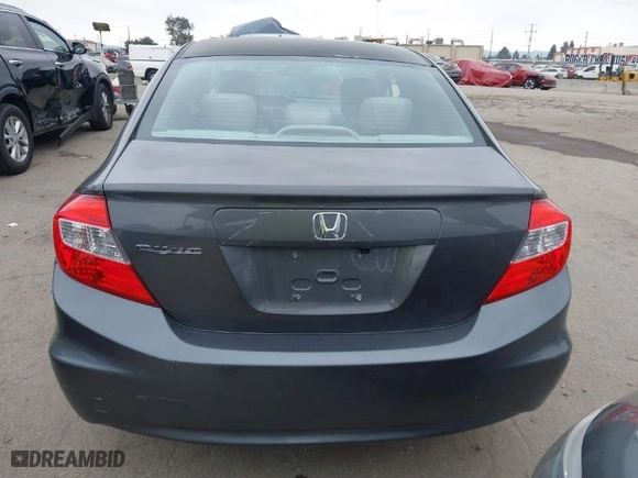 2012 Honda Civic Sdn LX with VIN 2HGFB2F58CH561907, listed as a IAAI auction lot 41881065 with 151,632 mi miles. Bid and sale history available at carsss.com. Image 16.