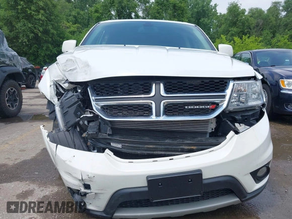 2019 Dodge Journey SE with VIN 3C4PDCBB6KT833777, listed as a IAAI auction lot 42411738 with 32,133 mi miles and . Bid and sale history available at DreamBid. Image 6.