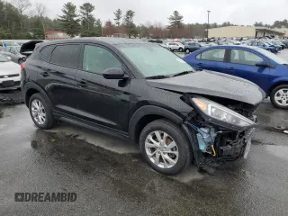 2019 Hyundai Tucson SE with VIN KM8J2CA45KU847041, listed as a Copart auction lot 52136855 with 75,210 mi miles and Salvage Title. Bid and sale history available at carsss.com. Image 4.
