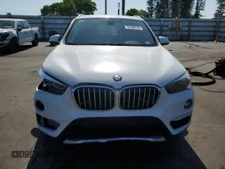 2018 BMW X1 sDrive28i z VIN WBXHU7C32J5H45283, wystawiony jako Copart lot #56382255 z przebiegiem 37 251 mil mil oraz Szkody całkowita. Historia ofert i sprzedaży dostępna na DreamBid. Obrazek 5.