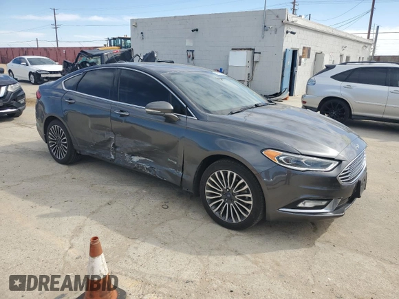 2017 Ford Fusion Titanium with VIN 3FA6P0SU7HR354444, listed as a Copart auction lot 50601035 with 159,069 mi miles and Salvage Title. Bid and sale history available at DreamBid. Image 4.