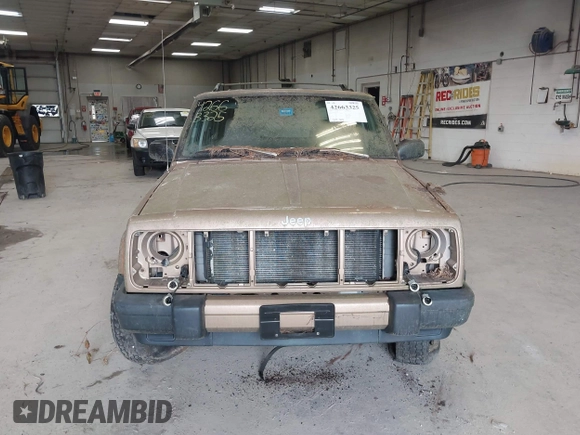 1999 Jeep Cherokee Sport with VIN 1J4FF68S0XL506805, listed as a IAAI auction lot 42663325 with 317,008 mi miles and . Bid and sale history available at DreamBid. Image 13.