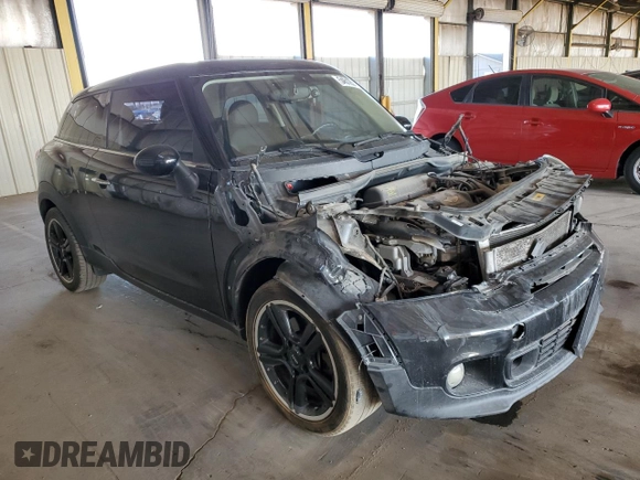2015 MINI Paceman S with VIN WMWSS5C54FWS99857, listed as a Copart auction lot 54612555 with 65,843 mi miles and Salvage Title. Bid and sale history available at DreamBid. Image 4.