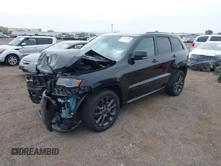 2018 Jeep Grand Cherokee Overland z VIN 1C4RJFCG1JC424108, wystawiony jako IAAI lot #42372298 z przebiegiem 42 438 mil mil oraz . Historia ofert i sprzedaży dostępna na DreamBid. Obrazek 17.